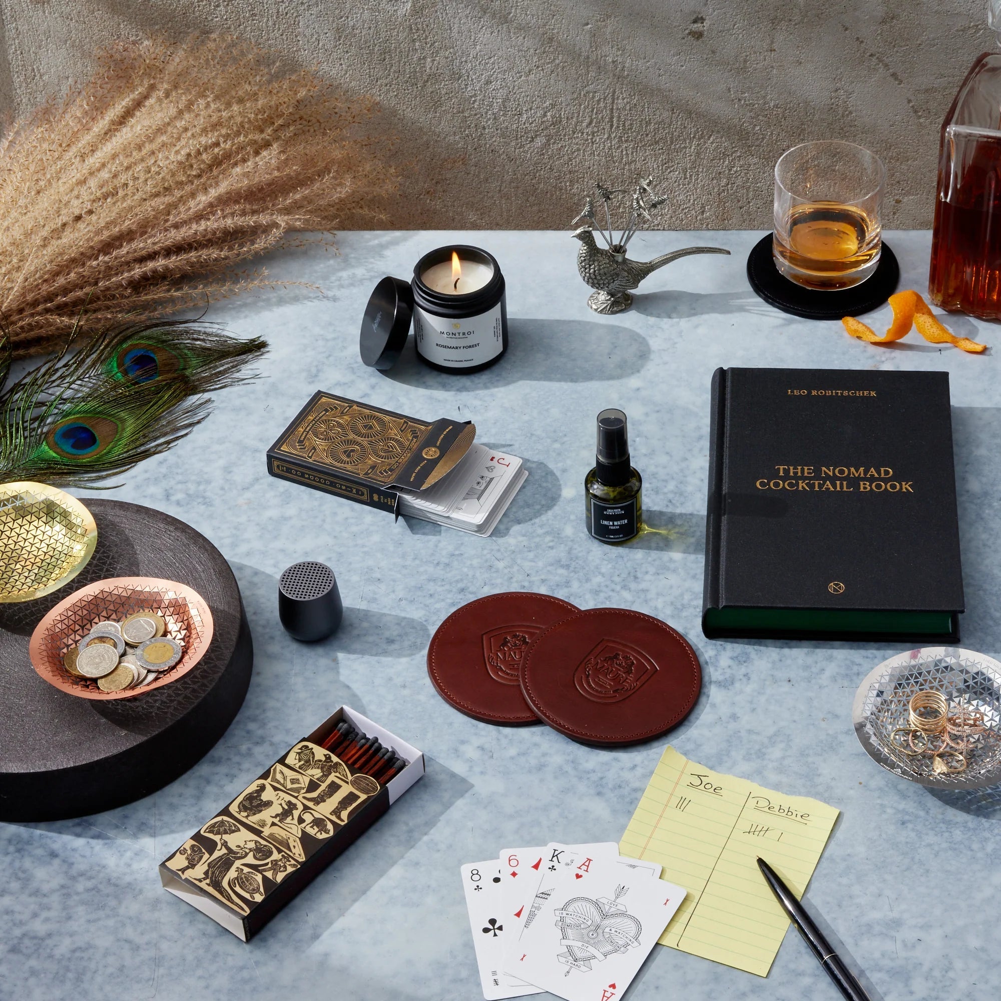 a table topped with lots of gifts for men