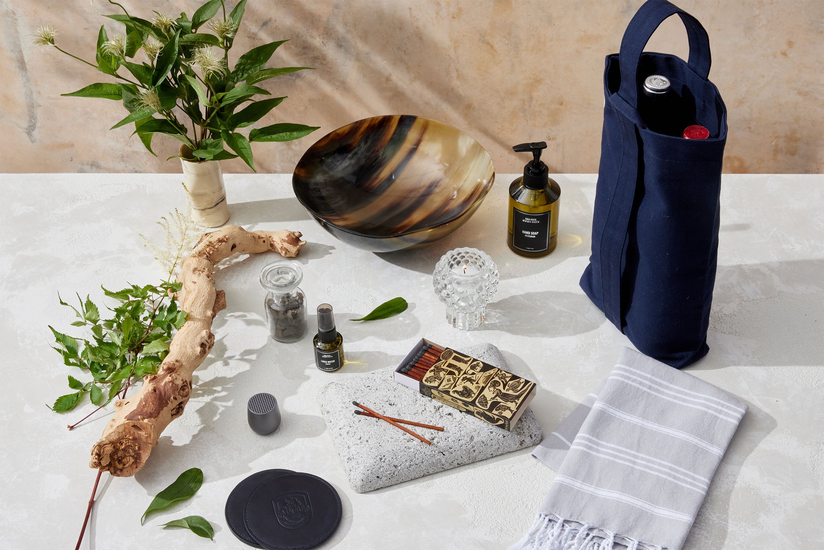 a table topped with array of housewarming gifts