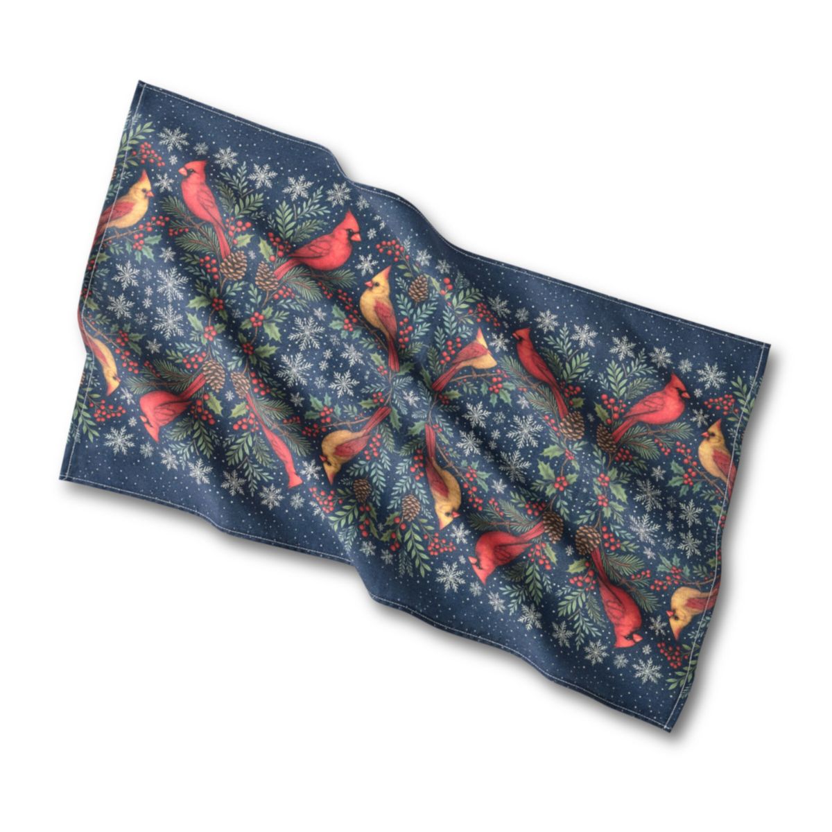 Festive fabric with red cardinals and greenery on a blue background