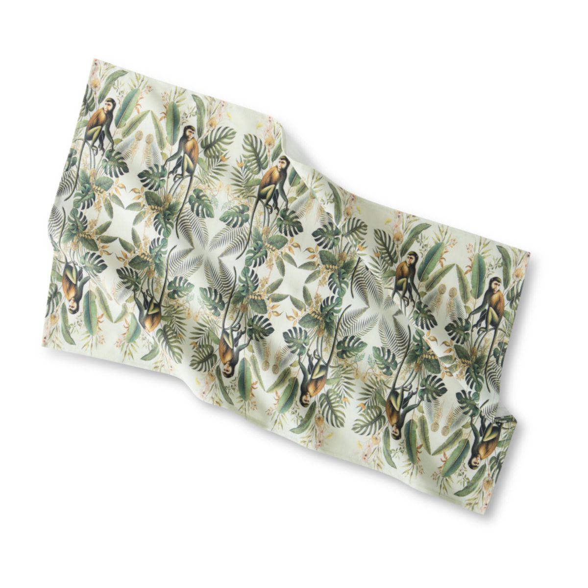 Floral patterned fabric with monkeys and leaves on a white background