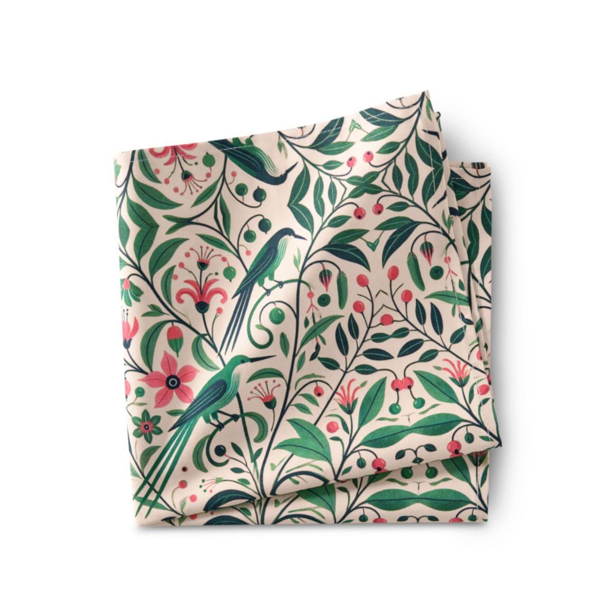 Folded fabric with a floral and bird pattern on a white background