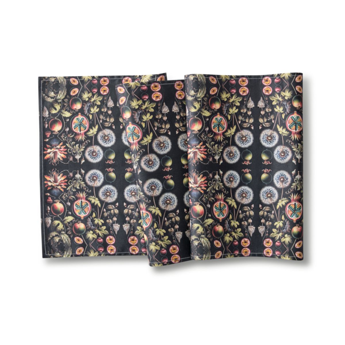 Two floral-patterned notebooks on a white background