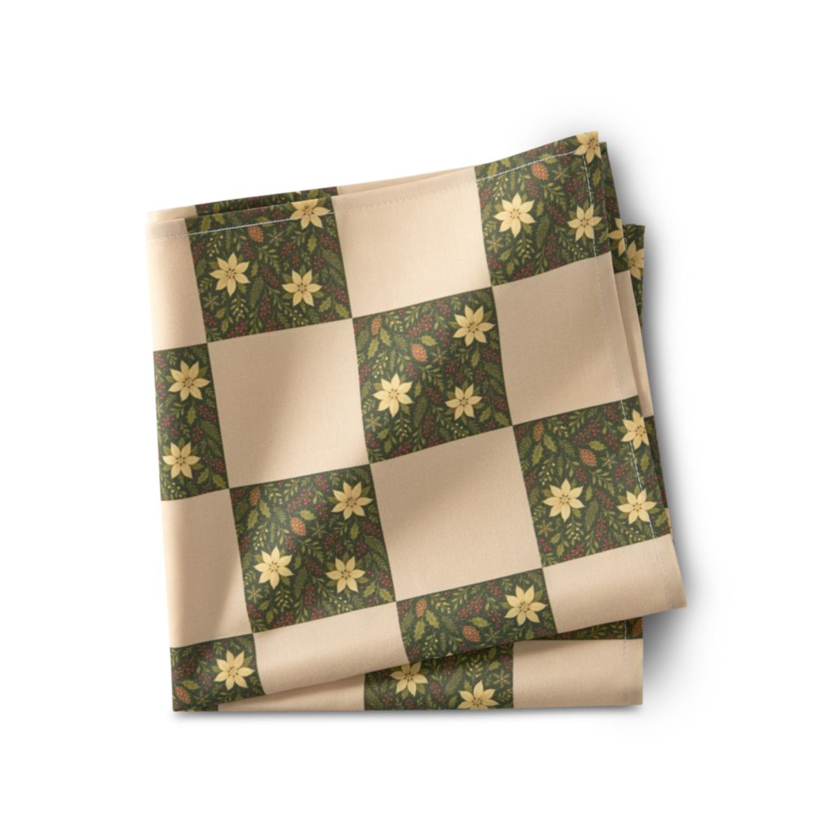 Folded checkered fabric with floral patterns on a white background