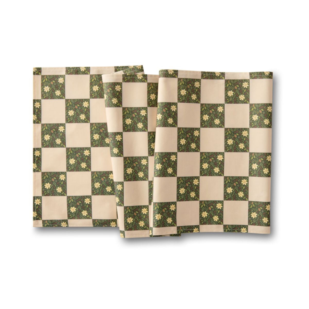 Two green and beige checkered placemats with floral patterns on a white background