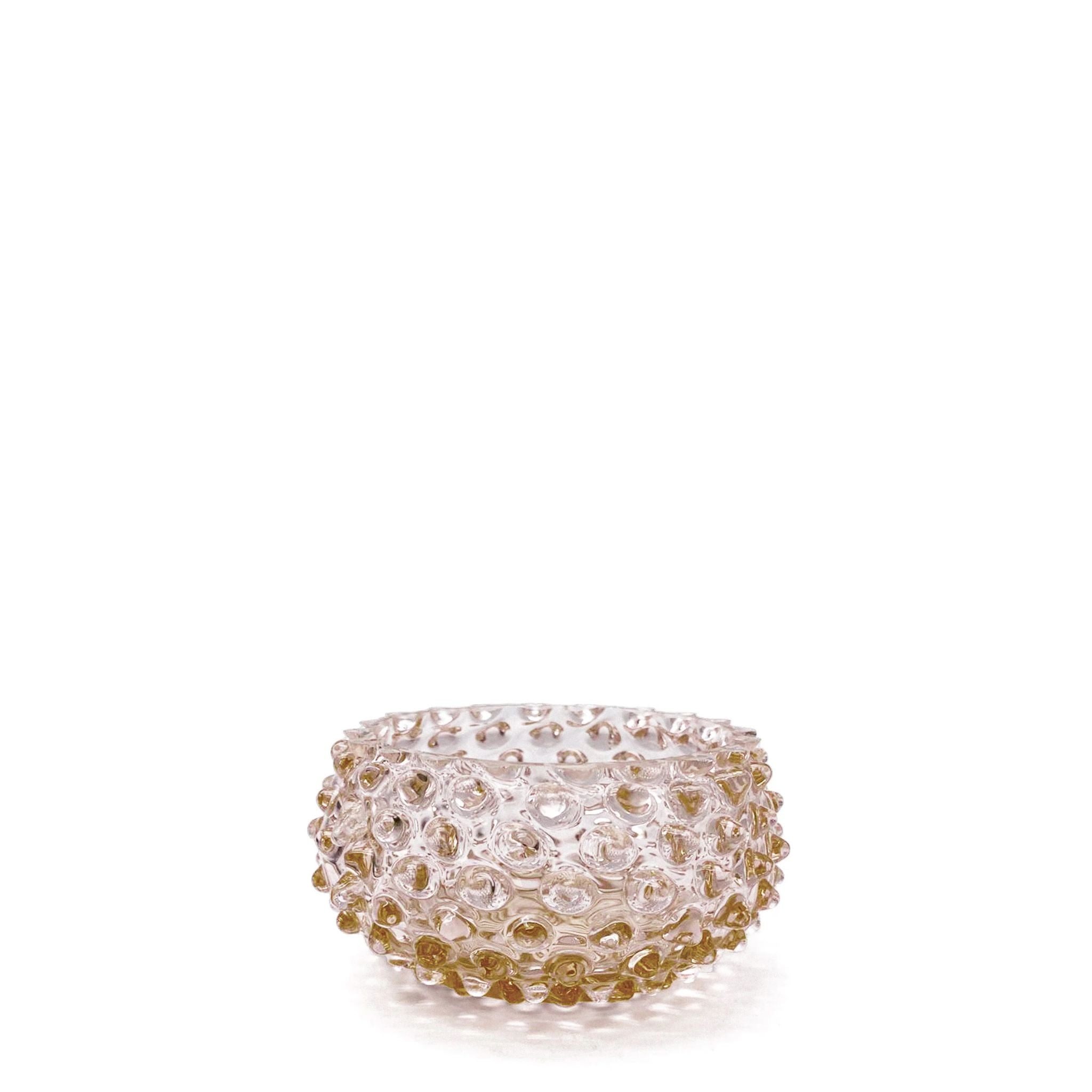 Decorative bowl with a textured surface on a white background