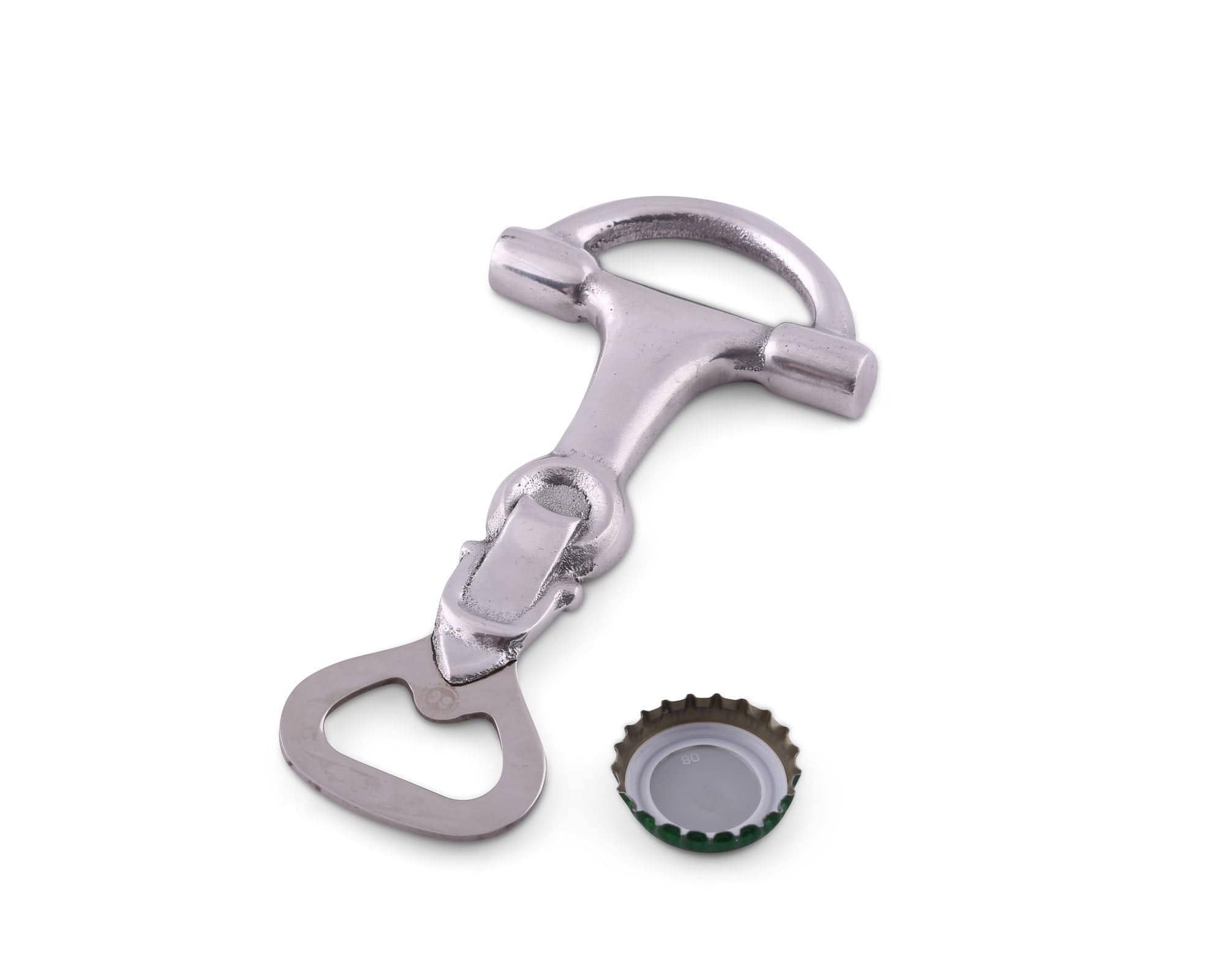 Metallic bottle opener with a cap on a white background