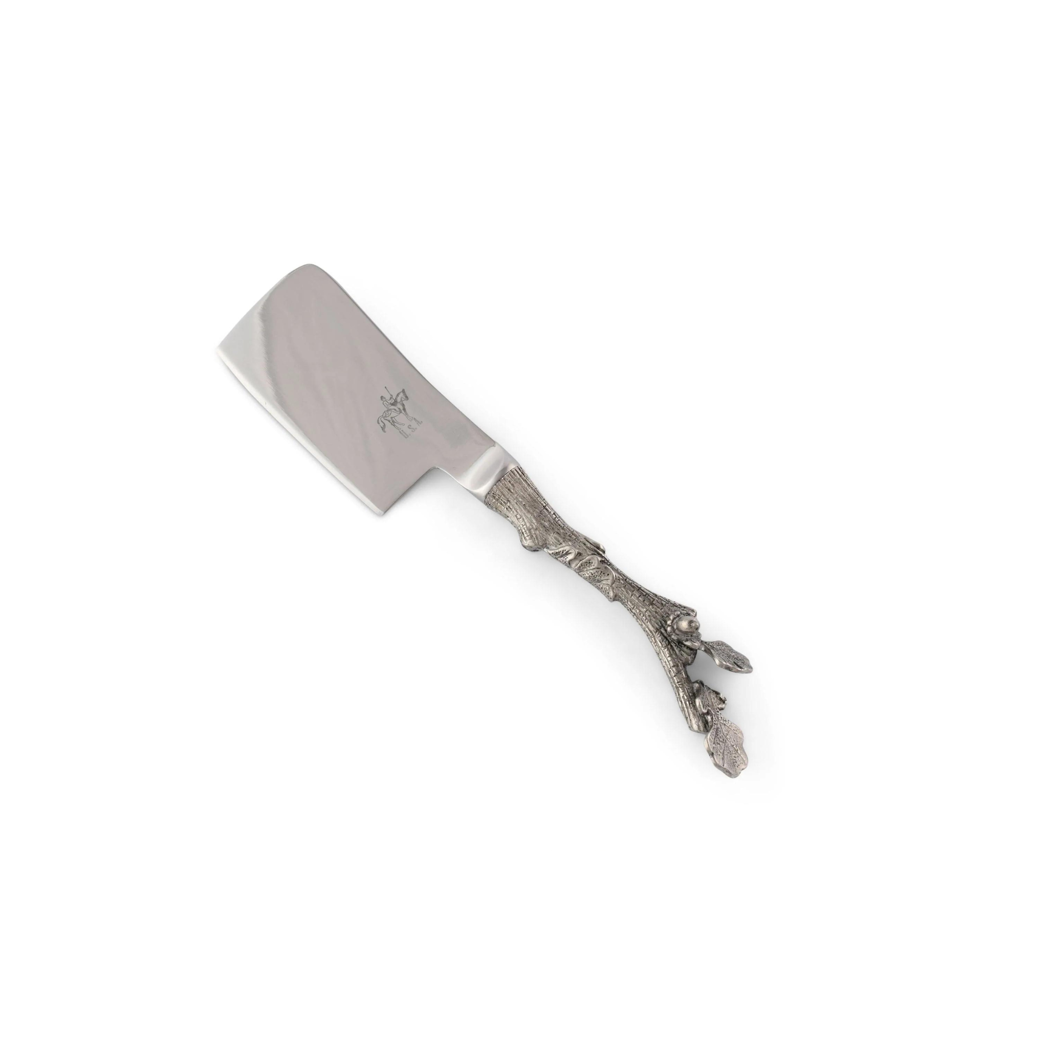 a cheese knife with an acorn handle on a white background