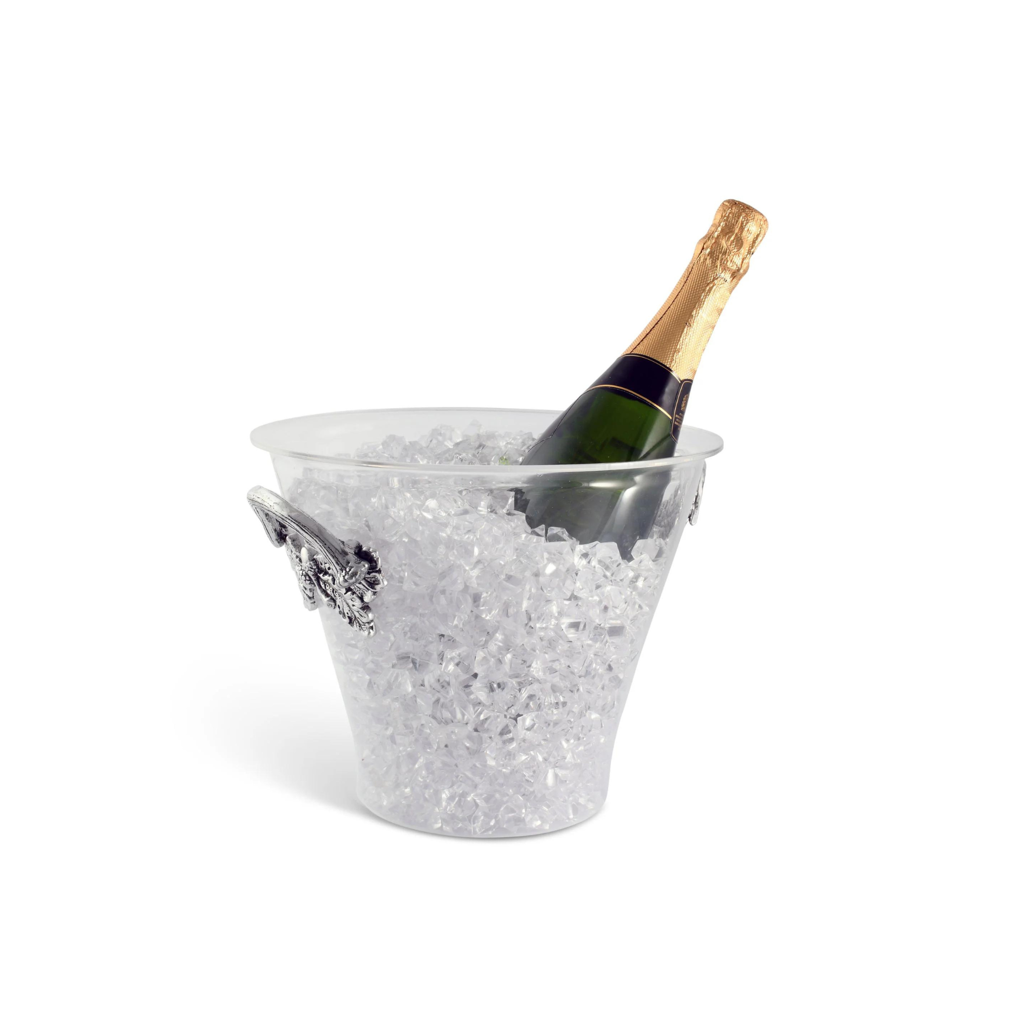 an acrylic ice bucket with metal antler and leave handles filled with ice and a champagne bottle