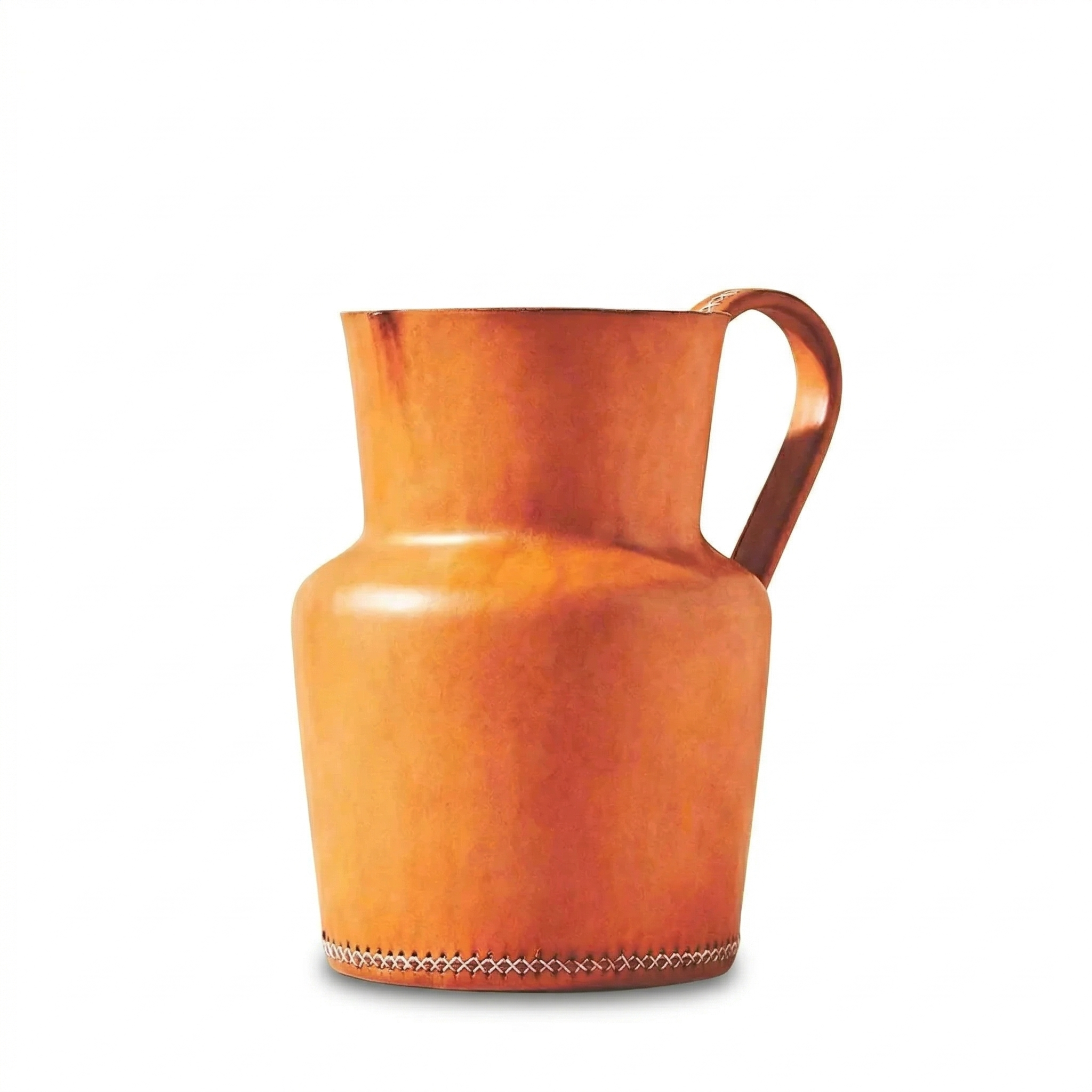 Orange leather pitcher with a handle on a white background