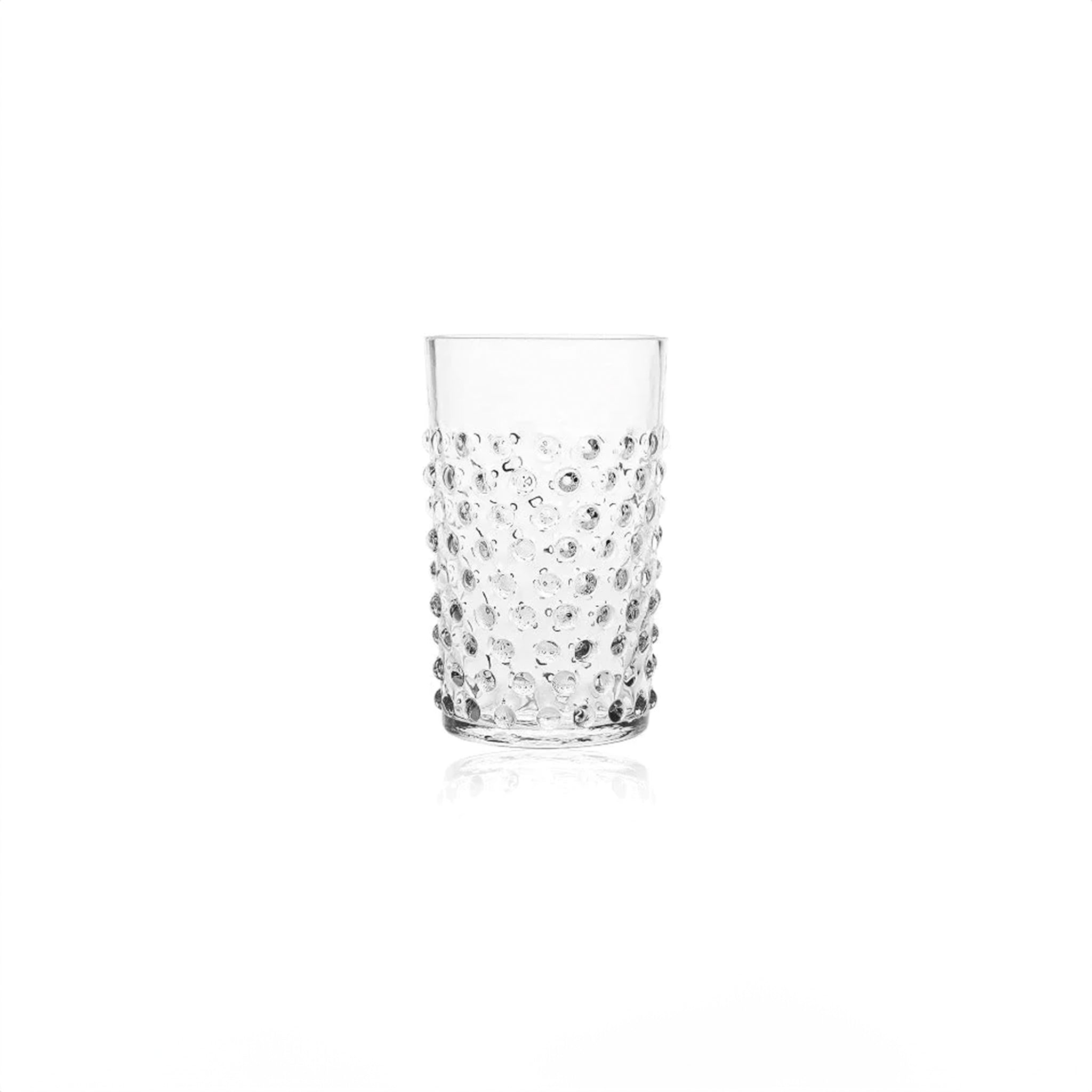 a shot glass with a white background