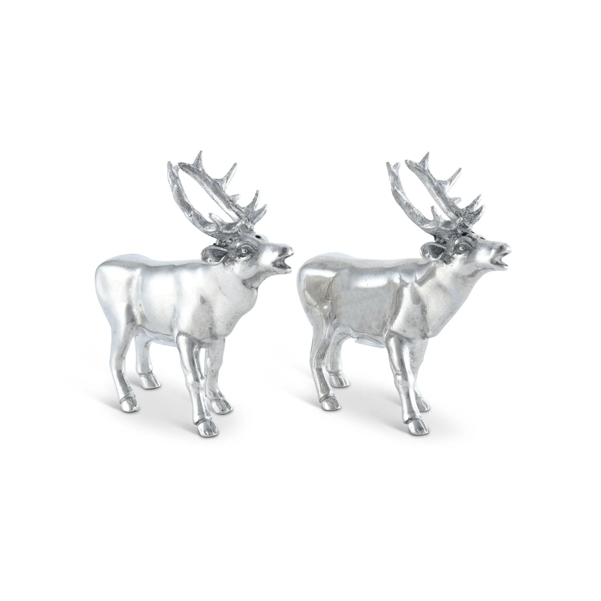 a pair of pewter deer salt and pepper shakers standing next to each other