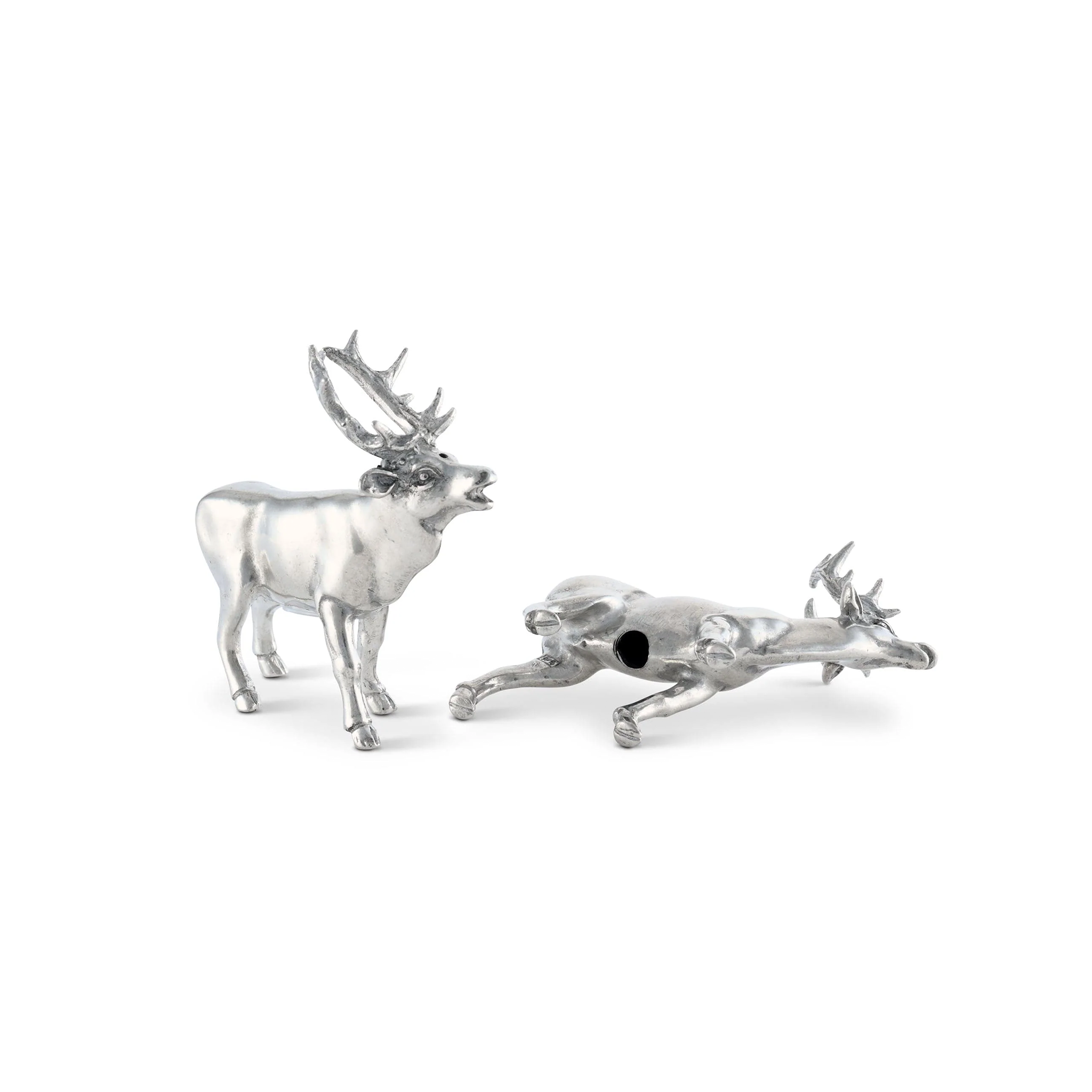 a pair of pewter deer salt and pepper shakers standing next to each other