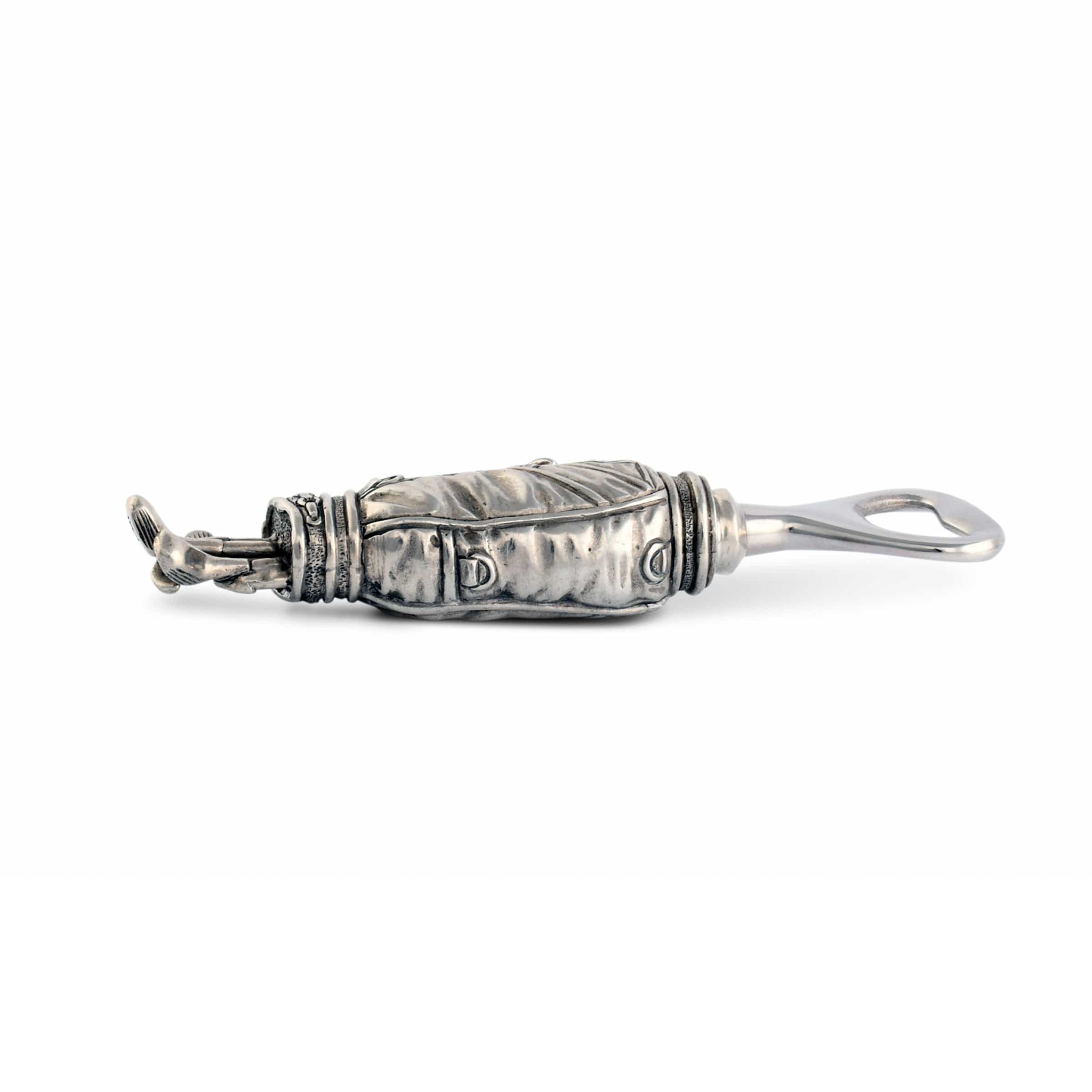 a pewter golf bag bottle opener on a white background