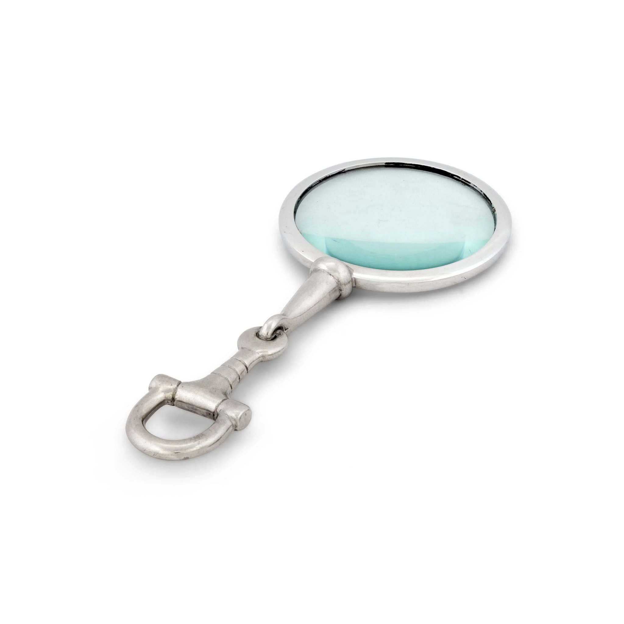 an equestrian pewter magnifying glass on a white surface