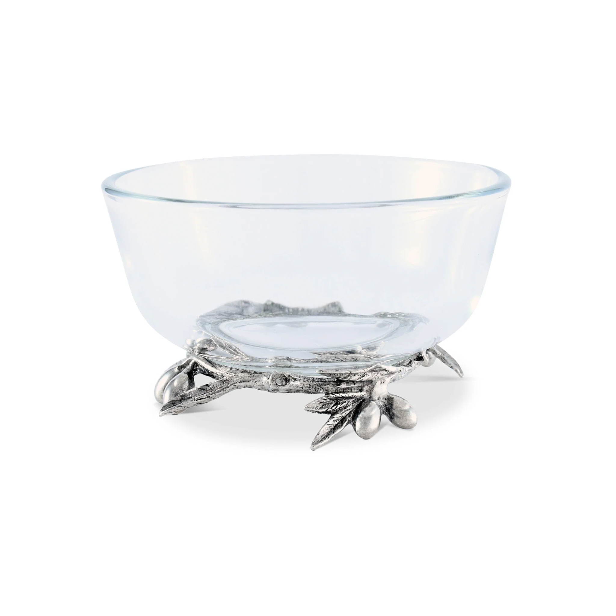 a glass bowl with pewter olives and leaves on it